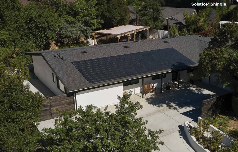 Solar panels on a residential roof, leading homeowners to wonder "Do solar panels damage roofing?"
